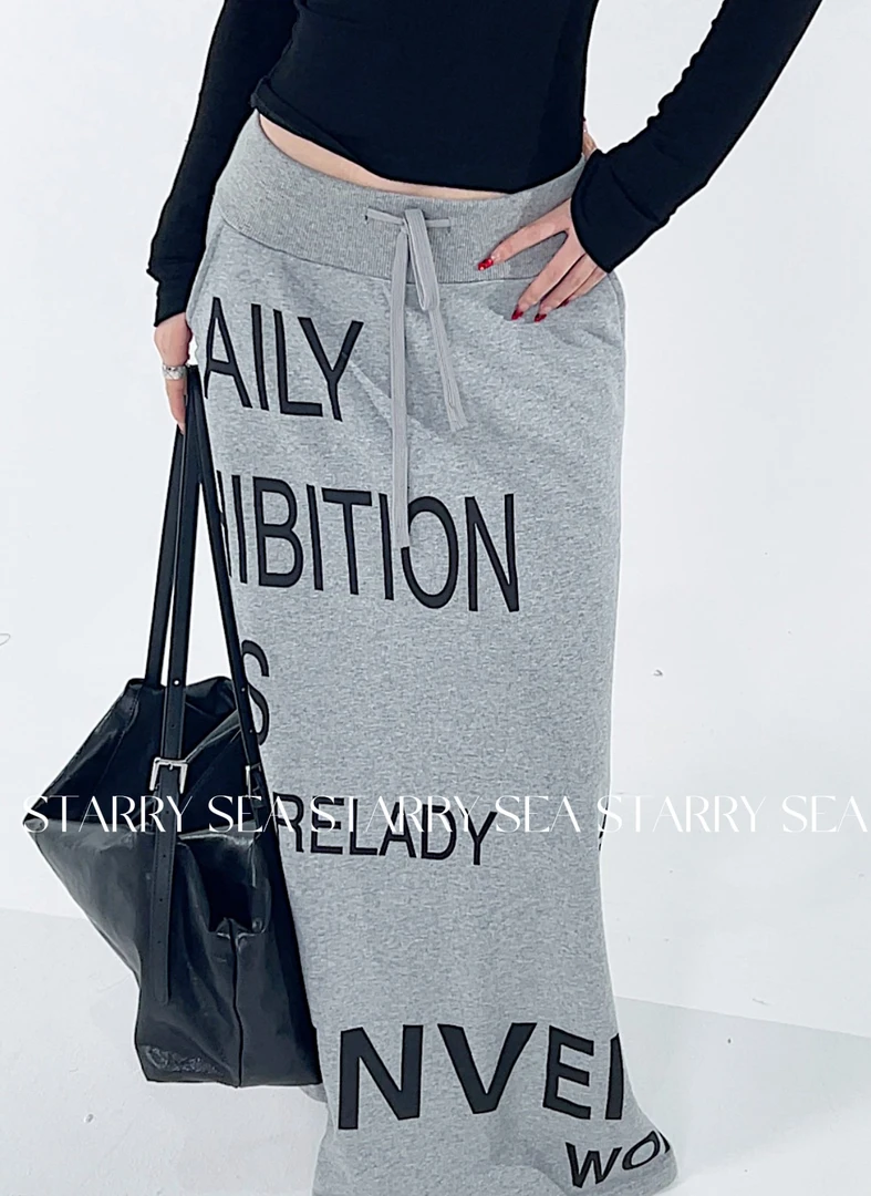 元林【纽约周刊】福利柔软中腰字母印花显瘦开叉A字半身裙#X0068KZ