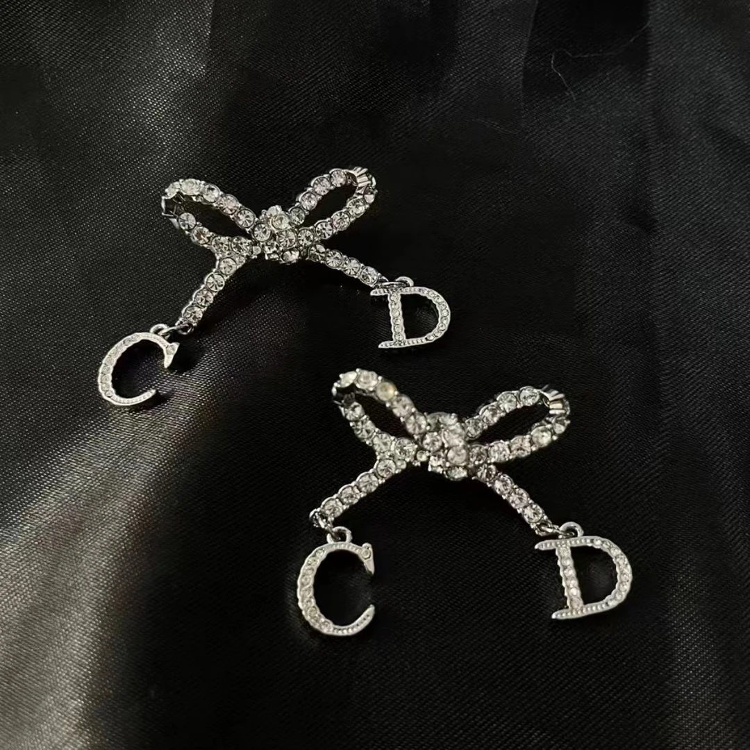 95新 DIOR/迪奥 多多奢品/迪奥蝴蝶结CD耳钉/98新