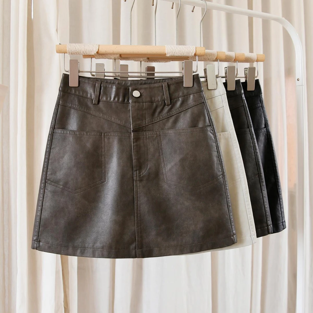 高腰a字皮裙半身裙女2024新款秋冬款棕色PU皮短裙包臀咖色小皮裙