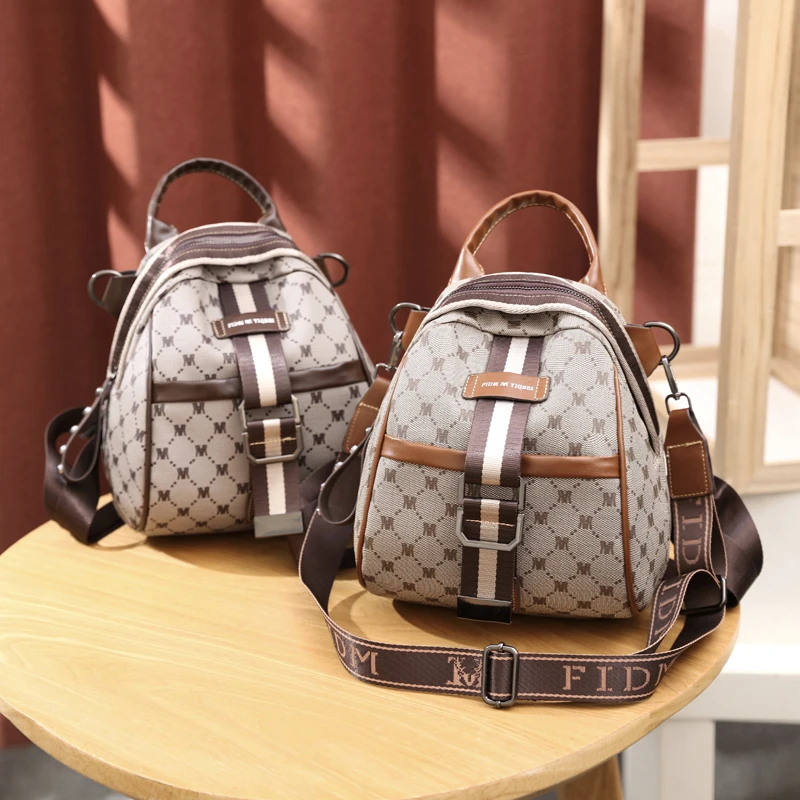 【今年流行】印花小背包韩版洋气撞色双肩包潮时尚外出背包休闲女士