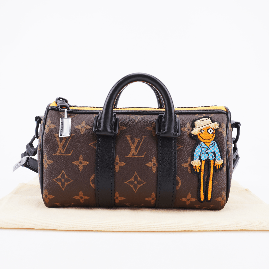 98-99新LV keepall xs老花稻草人贴饰斜挎包21/12/9 E720
