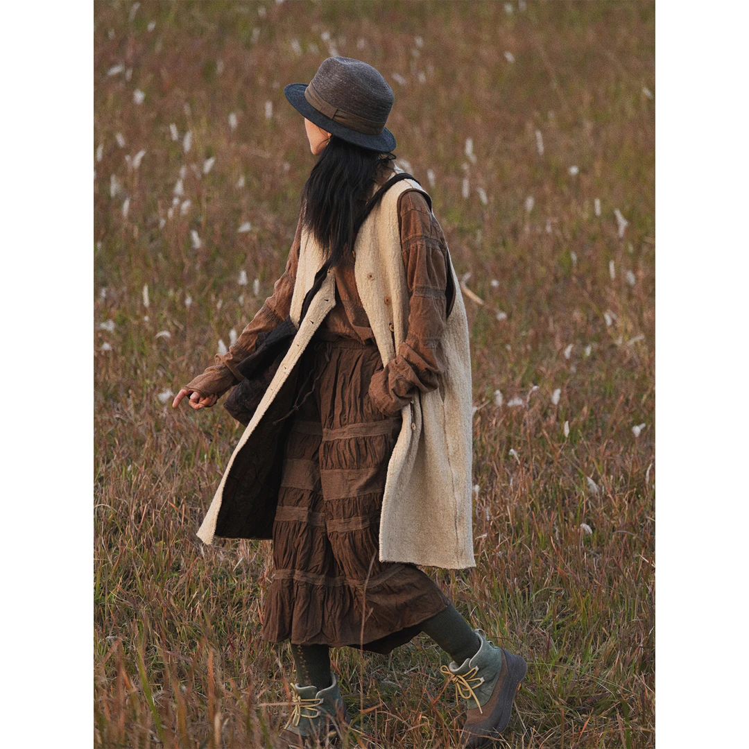 几见 原创秋季23年新款拼接背心裙马甲长上衣保暖W34609