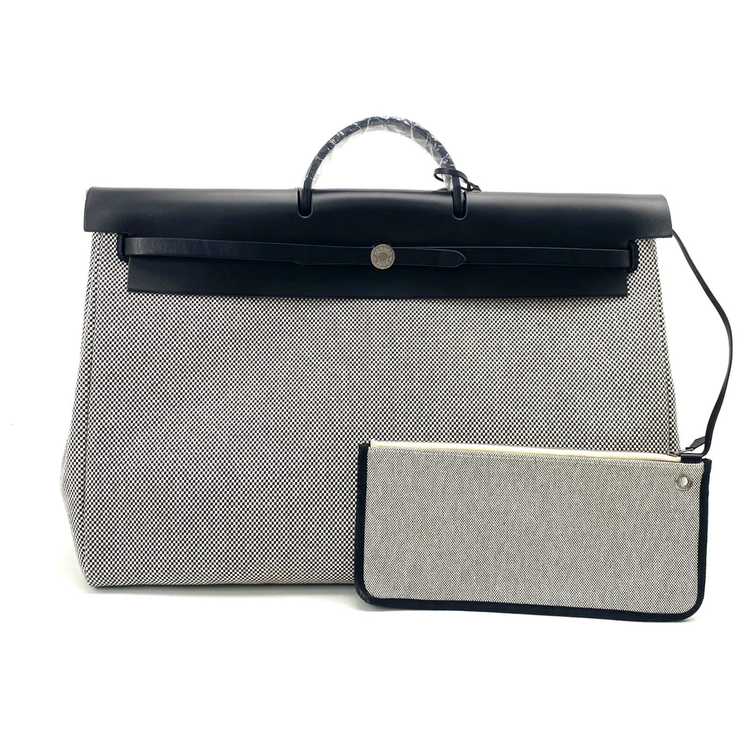99新 Hermes/爱马仕 99新黑色拼接herbag50手提包 尺寸50/34