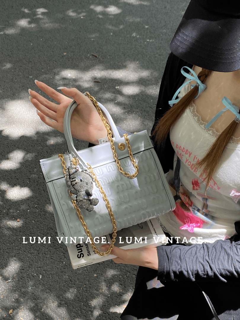 95新 MIU MIU/缪缪 蓝色羊皮弹幕手提斜挎包59897680