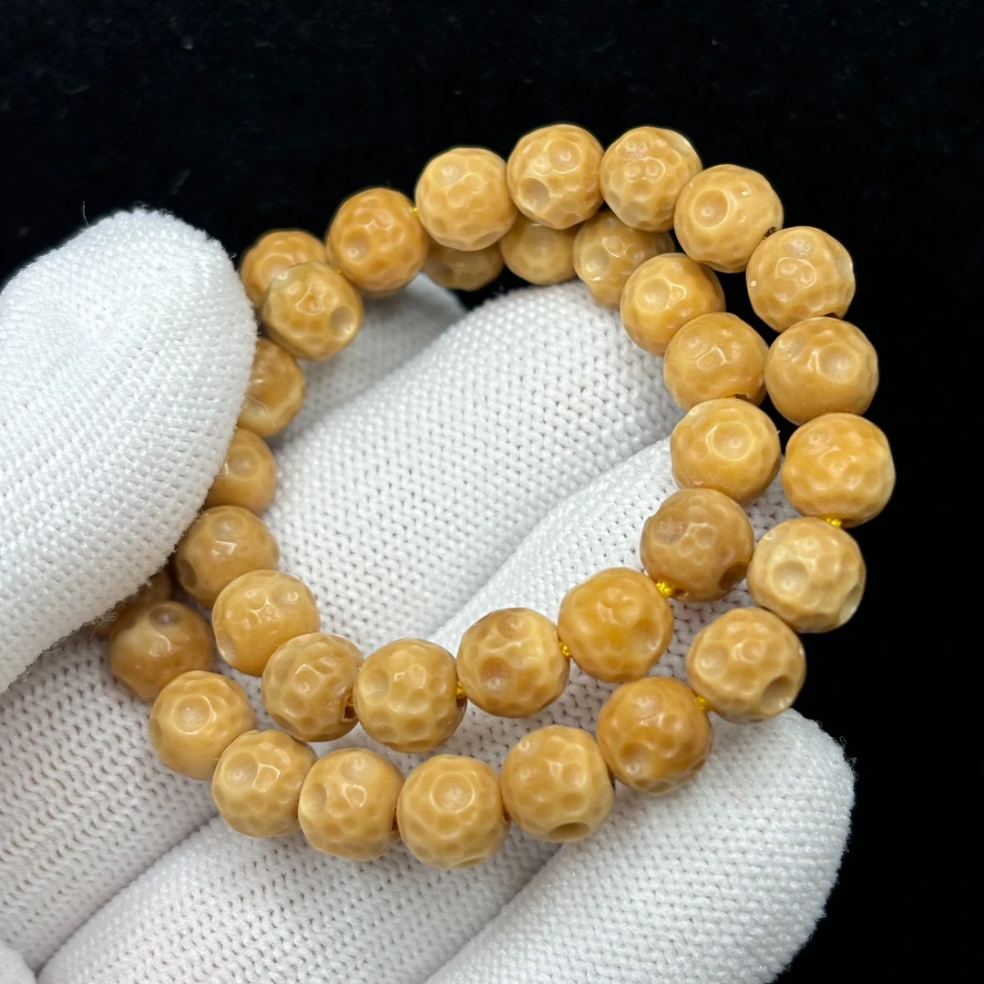 正宗龙脊菩提雕刻快乐星球糖球手持手串