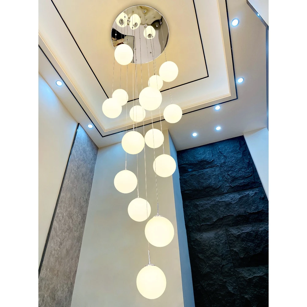 现代简约loft别墅酒店客厅轻奢复式公寓旋转楼梯长线圆球玻璃吊灯