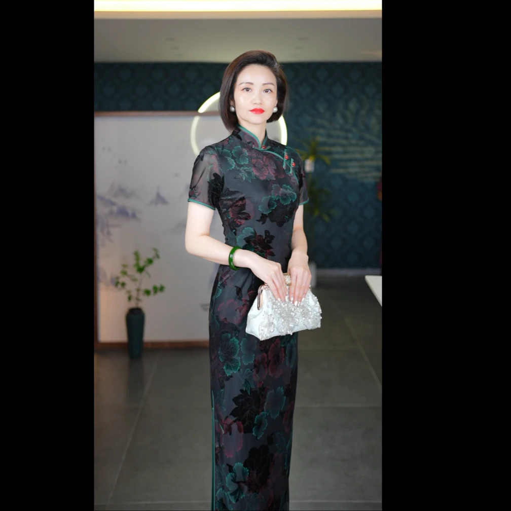 春夏新款2025高端优雅气质新中式旗袍绿色时尚长款日常修身显瘦