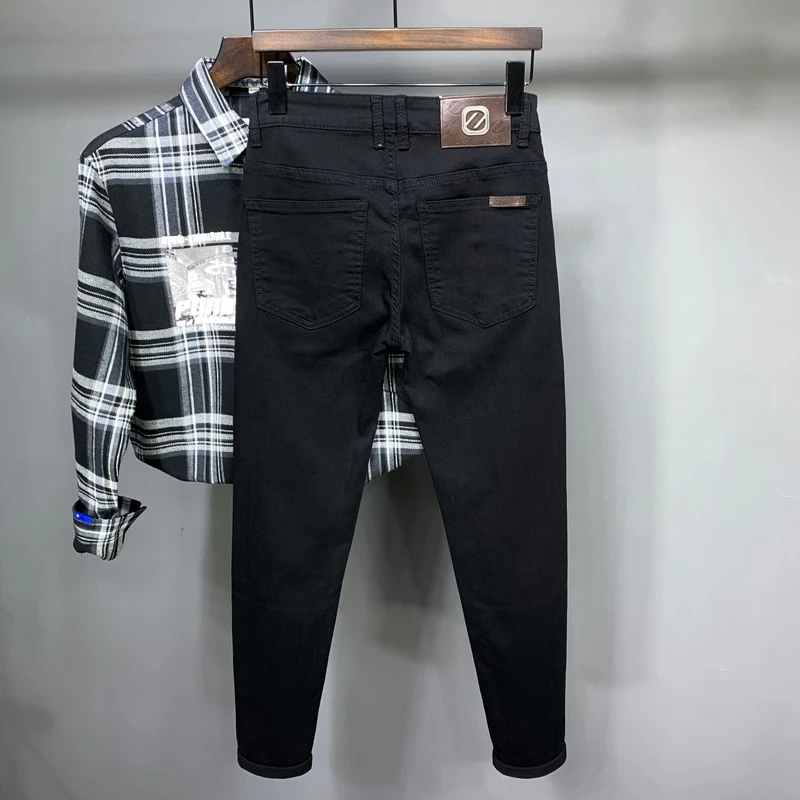 纯黑色牛仔裤男士2025冬季新款弹力百搭修身时尚高端简约风九分裤