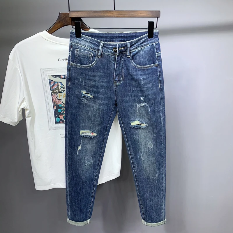 蓝色九分牛仔裤男冬季新款潮流百搭修身韩版弹力破洞男款小脚裤子