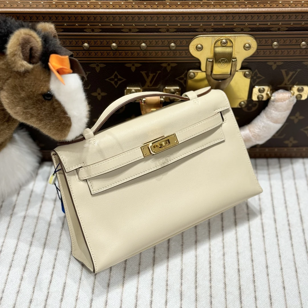 95新 Hermes/爱马仕 贝贝/爱马仕羊毛白一代金扣斜挎包