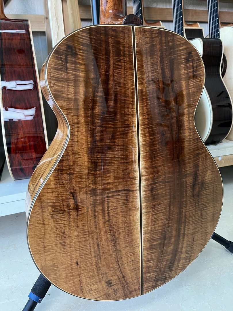 相思木手工全单民谣吉他，一体柄，手感好，音色佳，十年老料