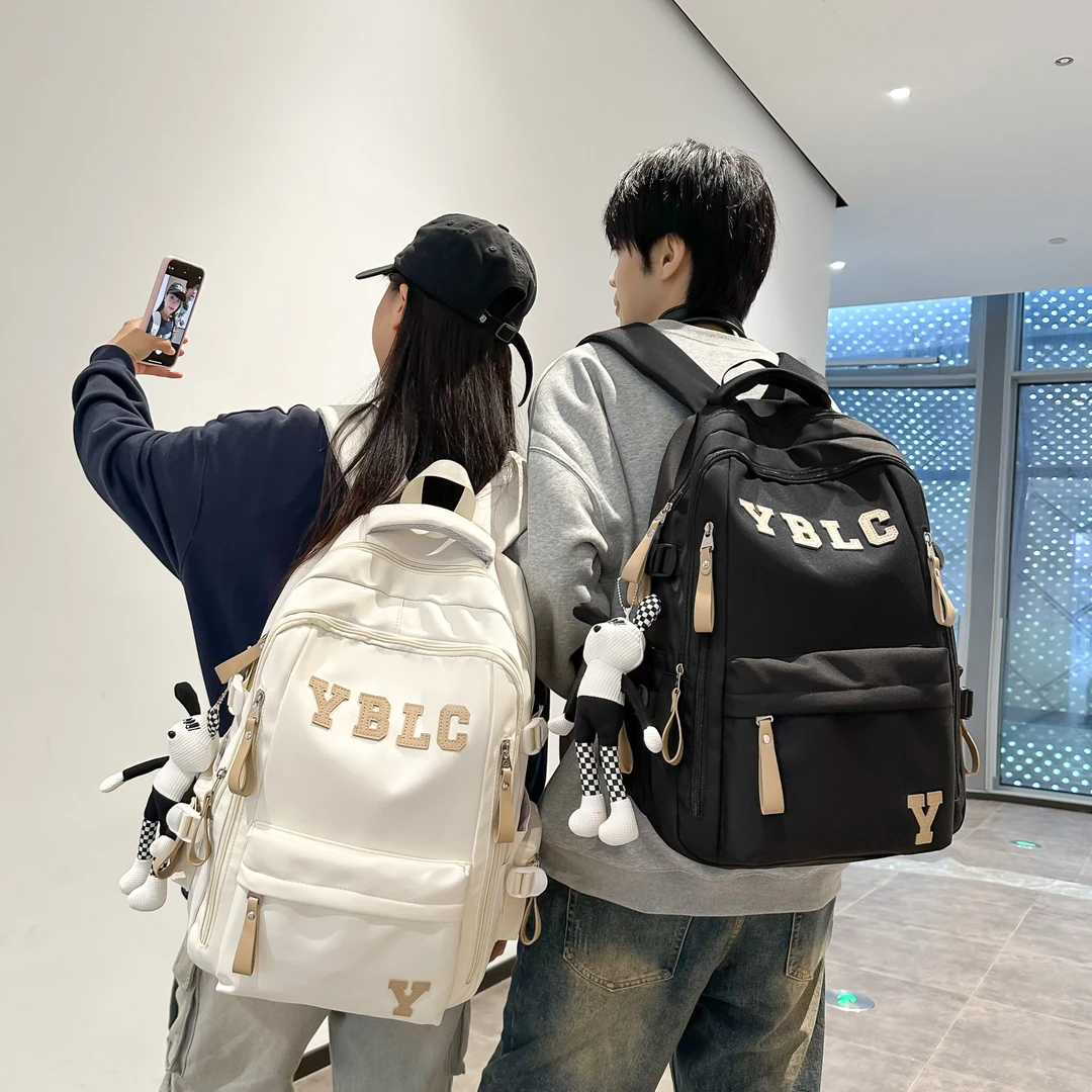 书包女生大学生双肩包男生初中生高中生小学生大容量多隔层背包