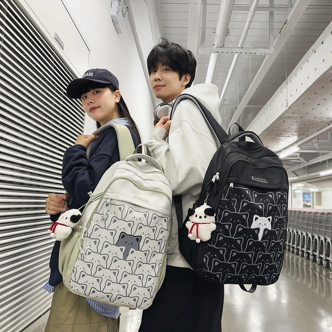 书包女初中生百搭原宿小众大学生大容量日系护脊减负涂鸦双肩包男