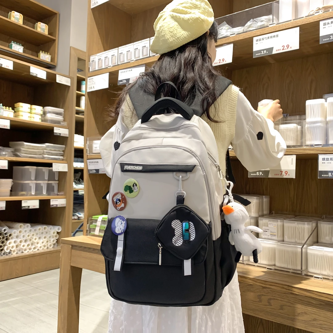 减负护脊大容量耐用中学生书包初中女生高中生2024新款双肩包背包