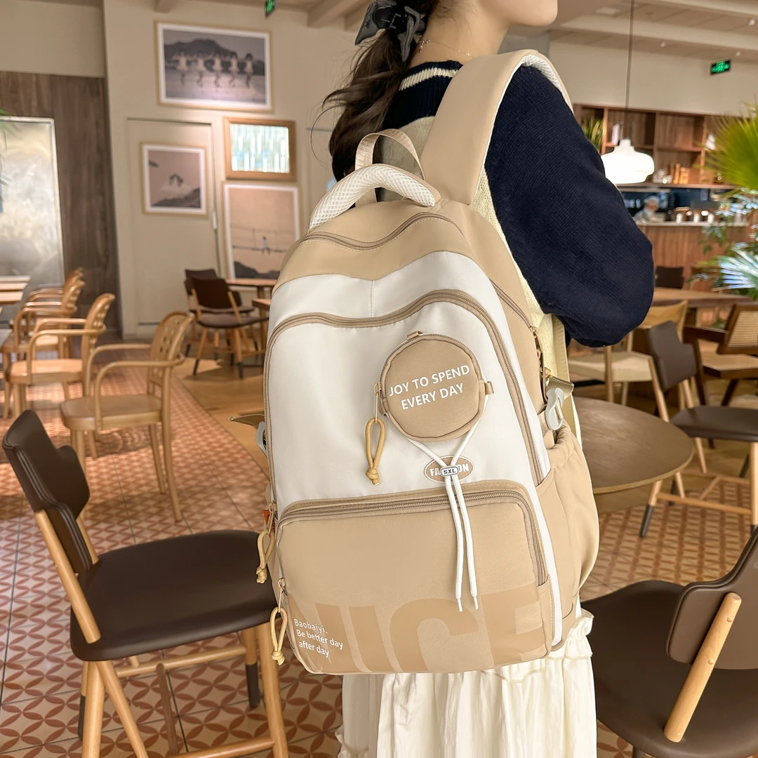 新款儿童书包女生大学生高中初中生大容量字母背包小学生双肩包