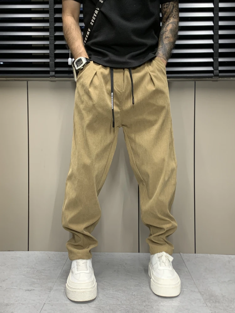 裤子男秋冬新款直筒休闲裤设计感潮牌哈伦裤松紧腰男士锥形小脚裤