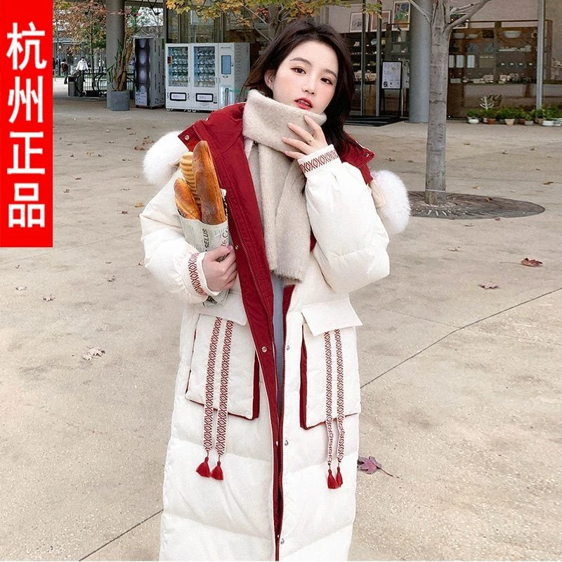 白色设计感小众羽绒棉服女中长款2023冬季新款韩版加厚过膝面包服