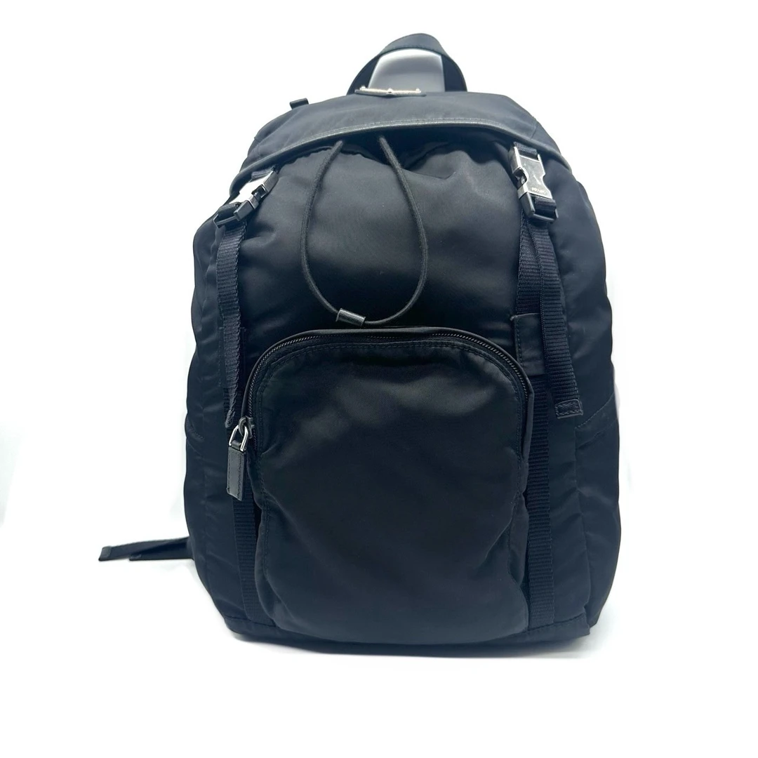 95新 Prada/普拉达 黑色尼龙帆布双扣双肩包 尺寸32/40