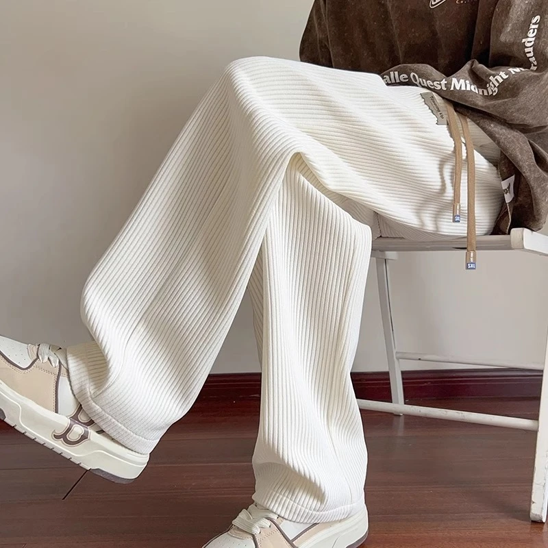 仓石一树轻奢米白色灯芯绒休闲裤男秋冬高级感运动卫裤直筒阔腿裤