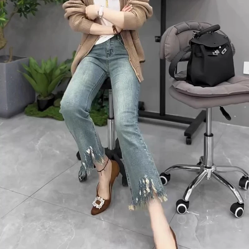 胖mm高腰弹力微喇叭牛仔裤女春秋梨形身材宽松显瘦毛边九分直筒裤