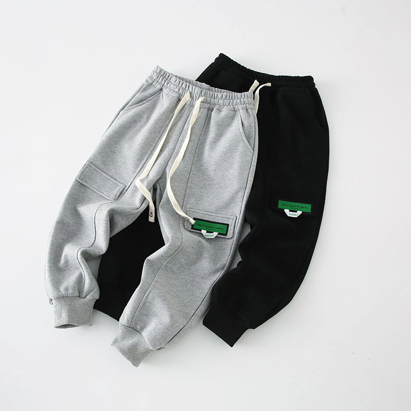 外贸工厂代工  儿童休闲工装口袋贴标中大童卫裤 9021