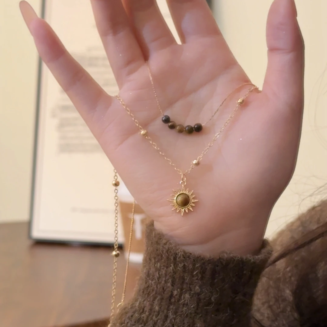 铜合金项链 轻奢秋冬虎眼石金色太阳花双层项链新款雅丹风锁骨链