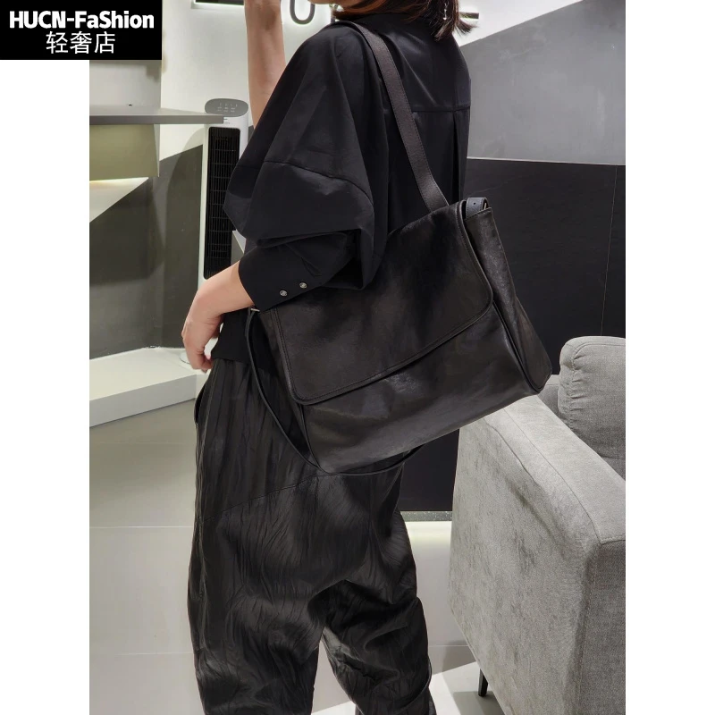 HUCN植鞣头层牛皮翻盖邮差包女2025新款复古真皮单肩包大容量包包