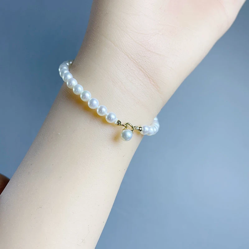 小提溜真珍珠手链18K金4.65-5正圆冷白手工古法做工编织带证书