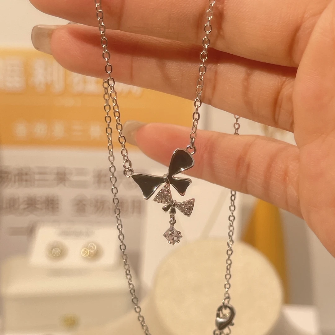 铜合金项链 5259黑色蝴蝶结流苏吊坠甜酷风精致高级轻奢项链