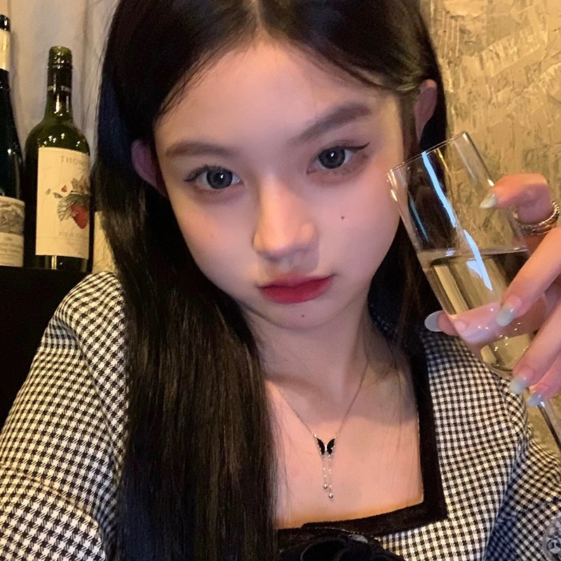 铜合金项链 5079黑色蝴蝶流苏吊坠甜酷风辣妹百搭精致毛衣链项链