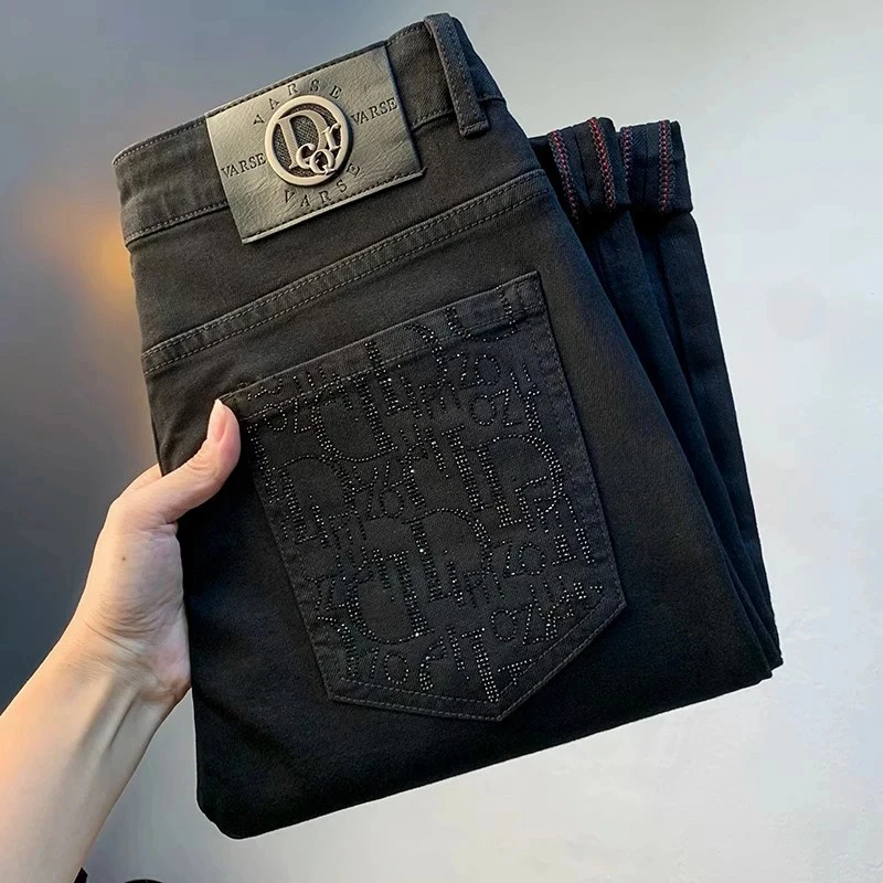 轻奢纯黑色修身小脚牛仔裤男2025夏季新款男生弹力烫钻直筒长裤子