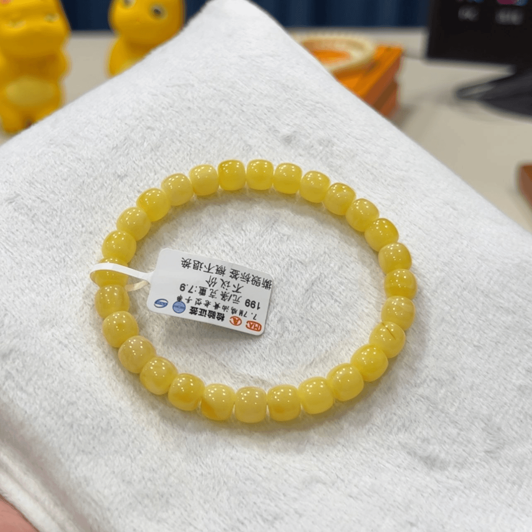【闪购商品】琥珀手链未镶嵌7.7m鸡油黄老型手串