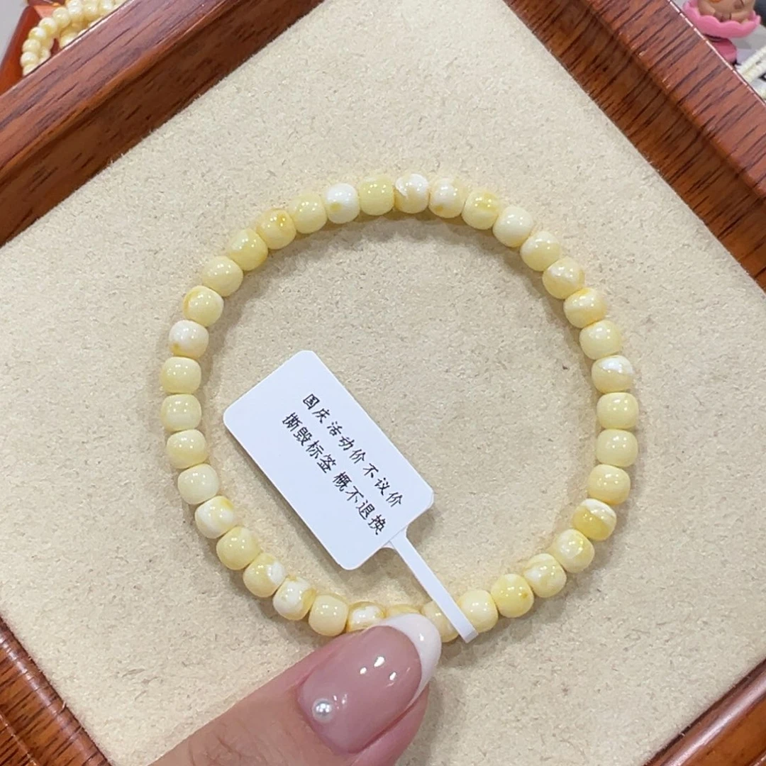 蜜蜡裸石未镶嵌5.5m白花皮色手串