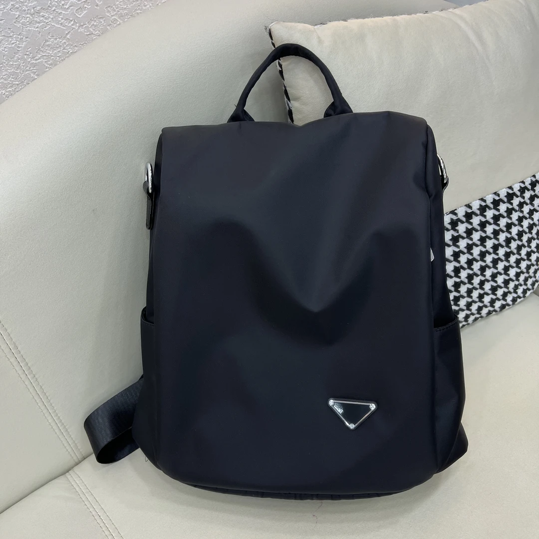 【小胡家】743新款小标牌双肩背包