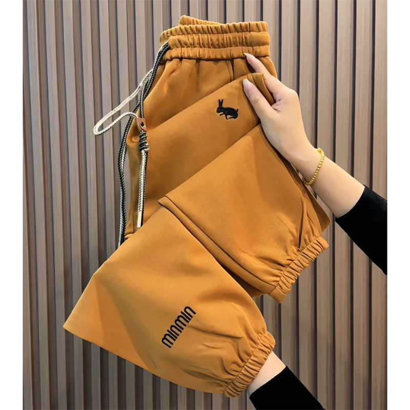 韩版高腰宽松显瘦刺绣休闲裤百搭洋气时尚运动哈伦裤个性爆款卫裤