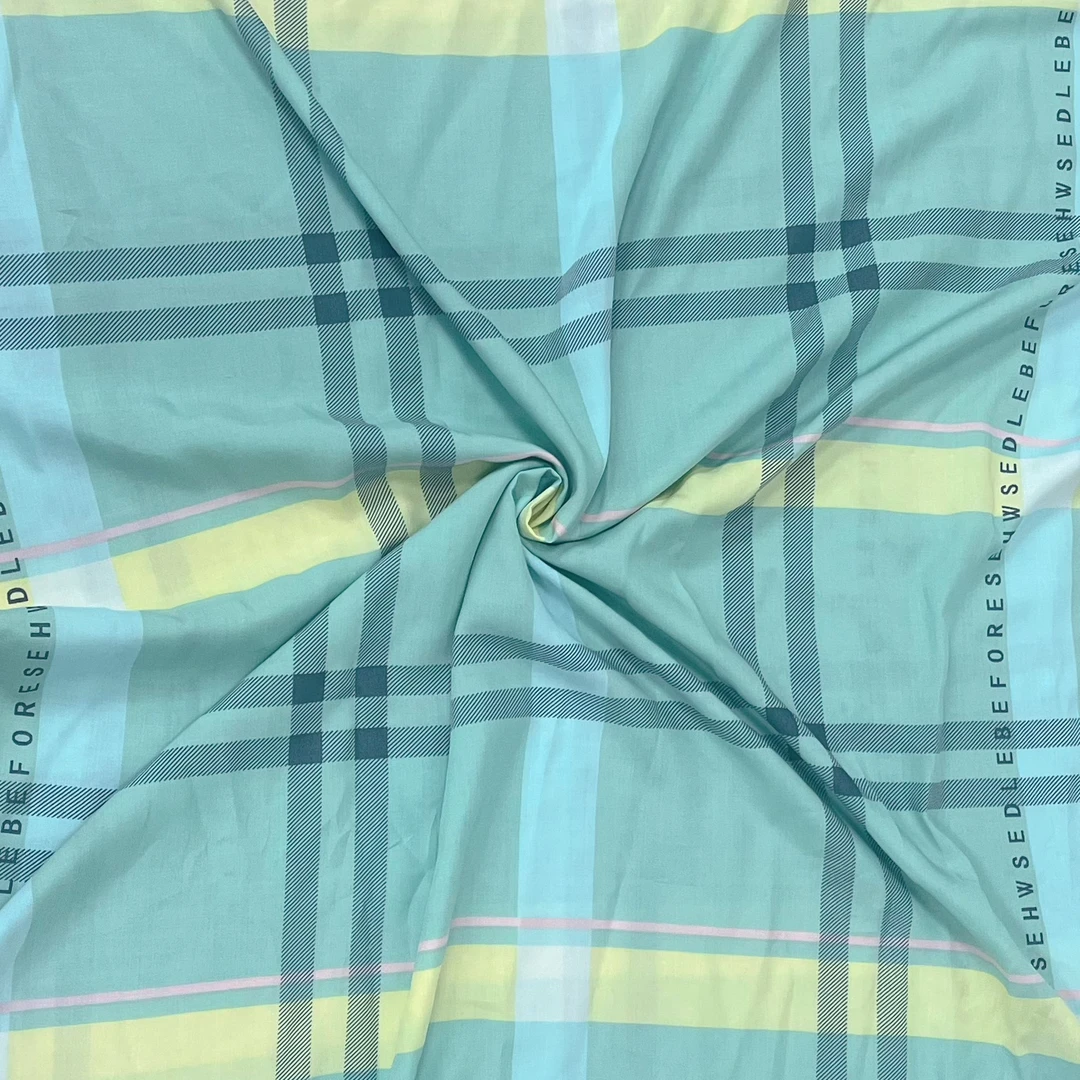 【云锦1店】241025-6号 浅蓝方格字母 棉绸服装布料面料