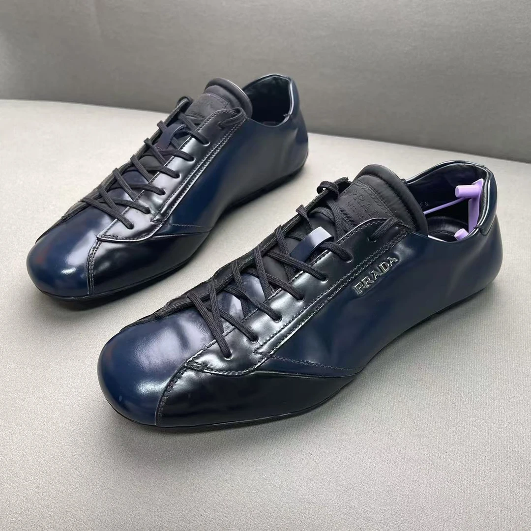 Prada/普拉达藏蓝色亮漆面侧翼logo时尚百搭平底板鞋 40.5码/95新
