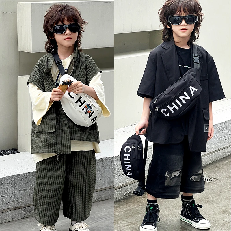新款儿童时尚洋气字母拉链尼龙布腰包斜挎包8岁男女童手机零钱包