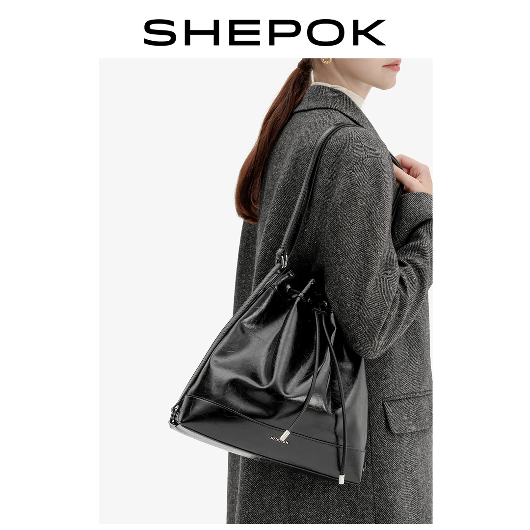 SHEPOK西泊克新款牛皮双肩包通勤大容量女士背包抽绳单肩包水桶包