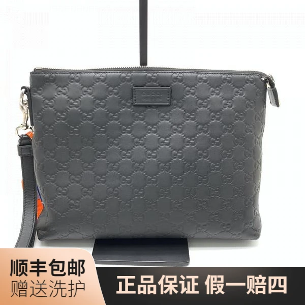 95新 GUCCI/古驰 古驰黑老花压印手拿包/10017781二奢男包 奢侈品