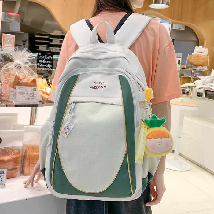 时尚高颜值大容量双肩包男女初高中大学生减负减压撞色双肩背包