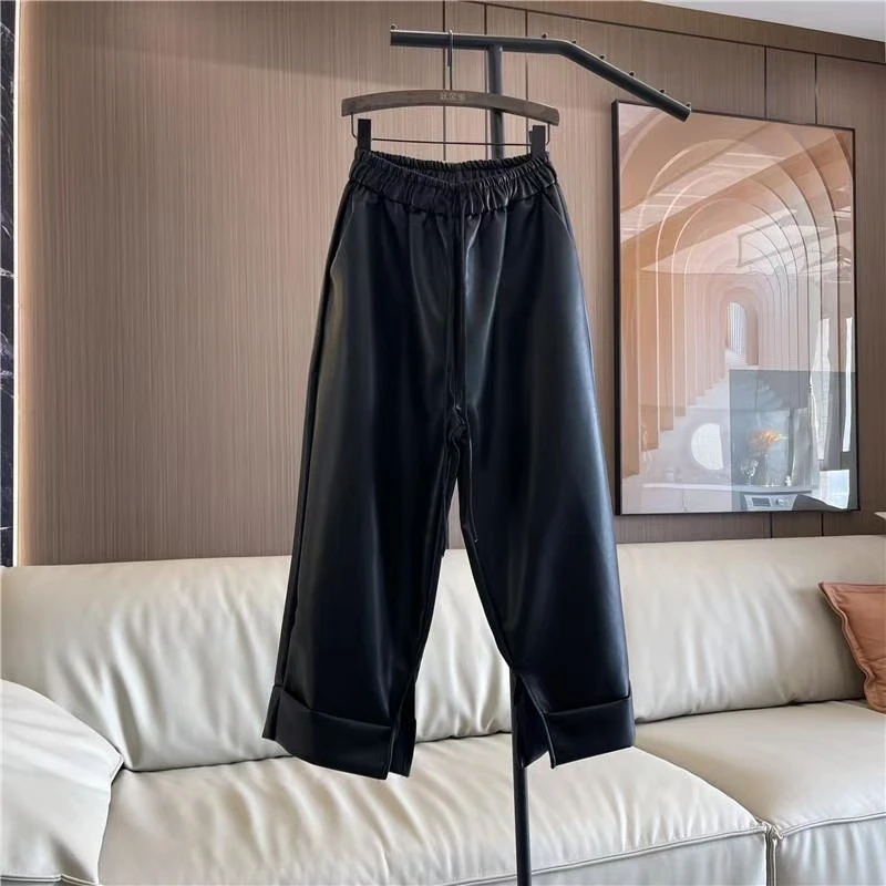 2025年秋冬松紧高腰潮流百搭时尚黑色纯色开叉卷边宽松九分阔腿裤