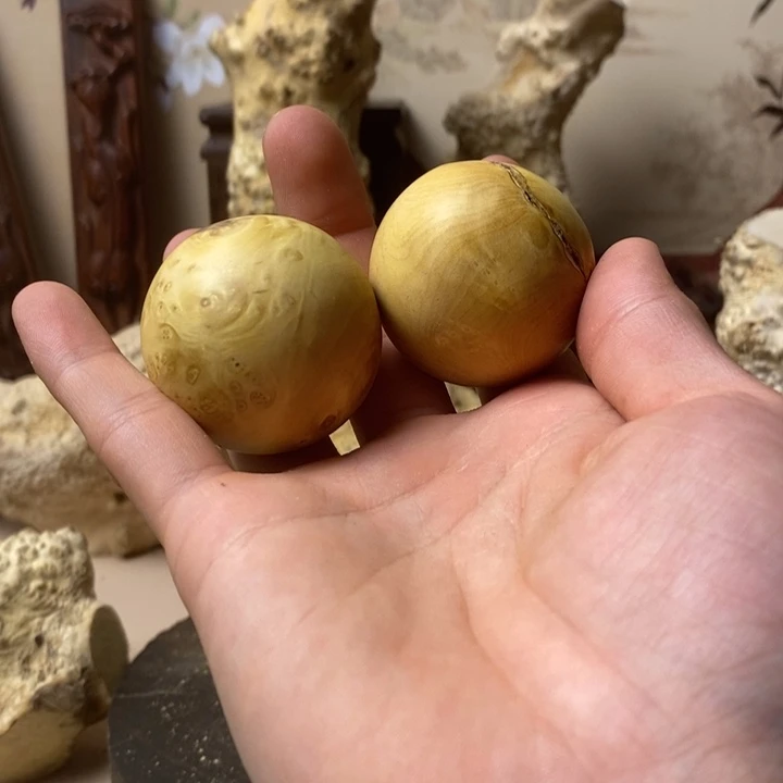楠木第**堂黄杨木手把件