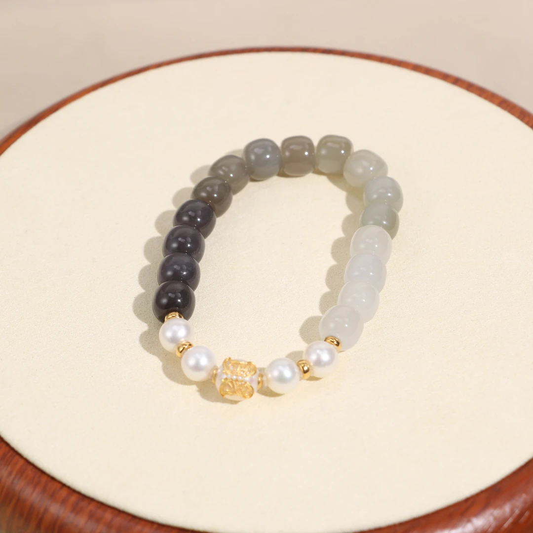 新成珠宝和田玉老型珠烟紫手串珍珠