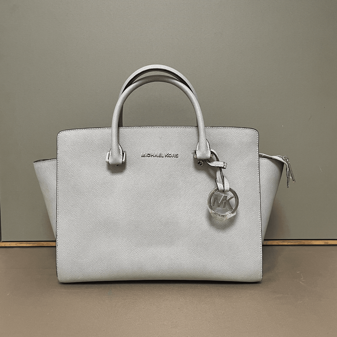 95新 MICHAEL KORS/迈克高仕 十字纹笑脸耳朵包