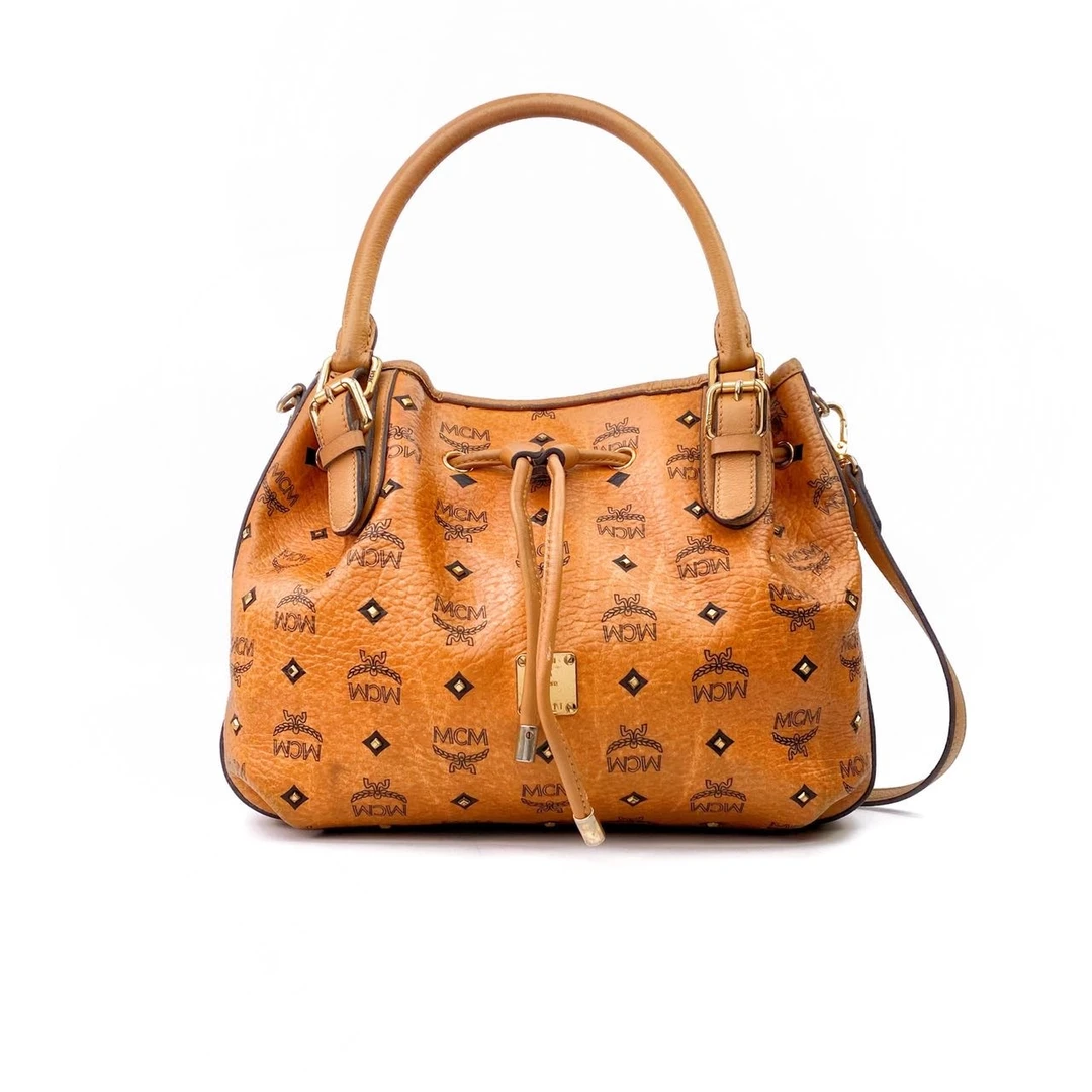 95新 MCM 老花牛皮干邑色金标水桶包手提单肩包