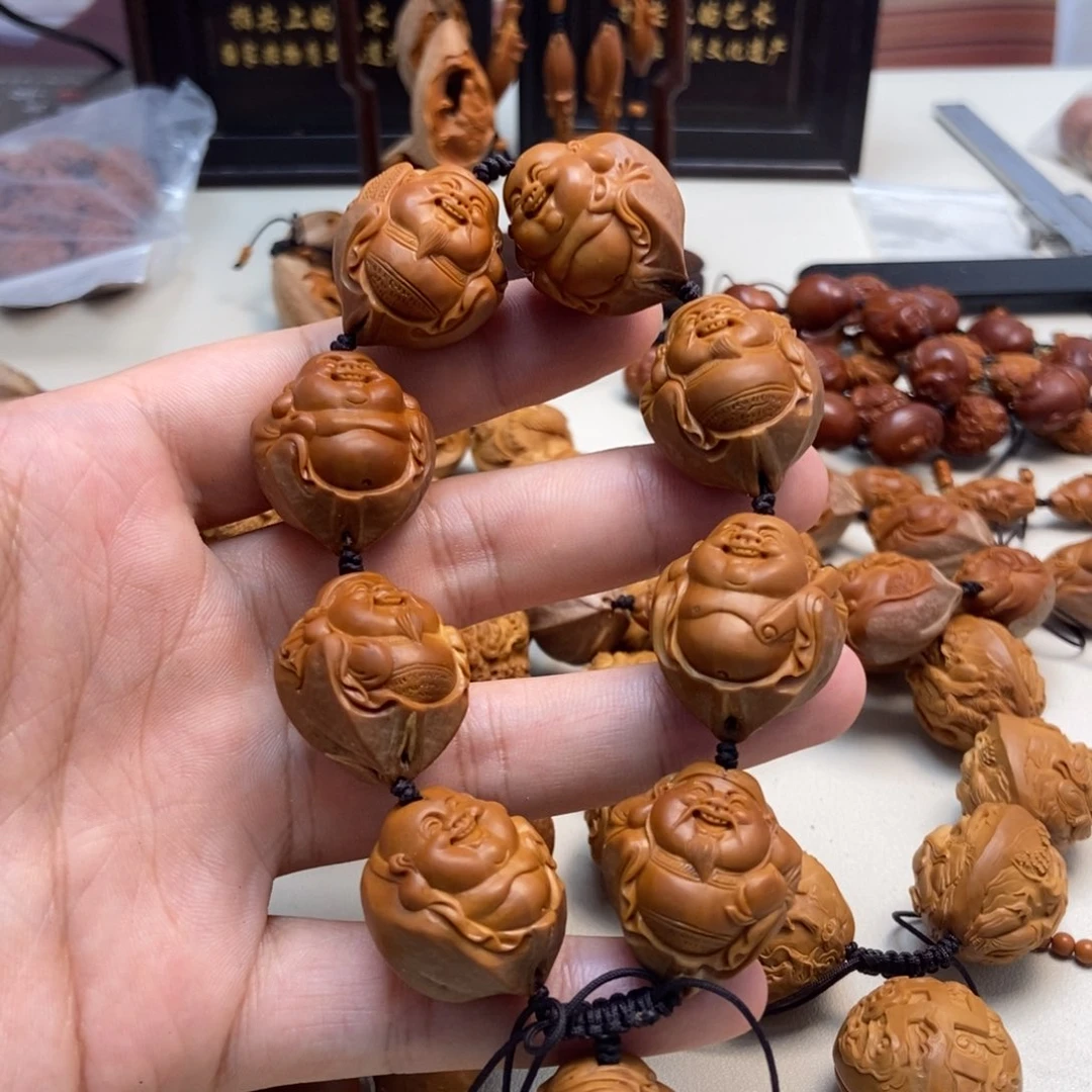 橄榄核手串晚**生包衣财迷