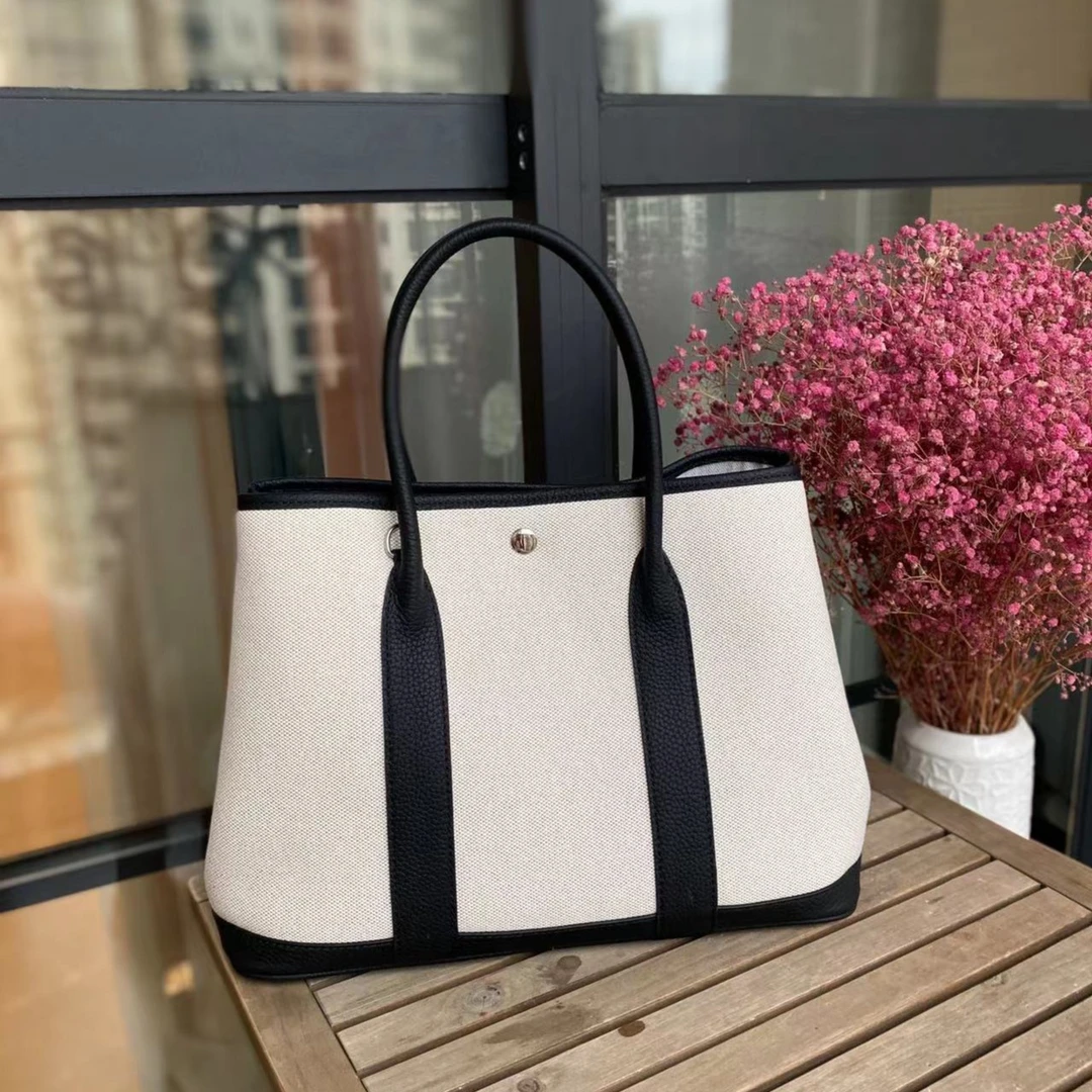 新款高级感摩登女士头层牛皮配帆布时尚花园包轻奢