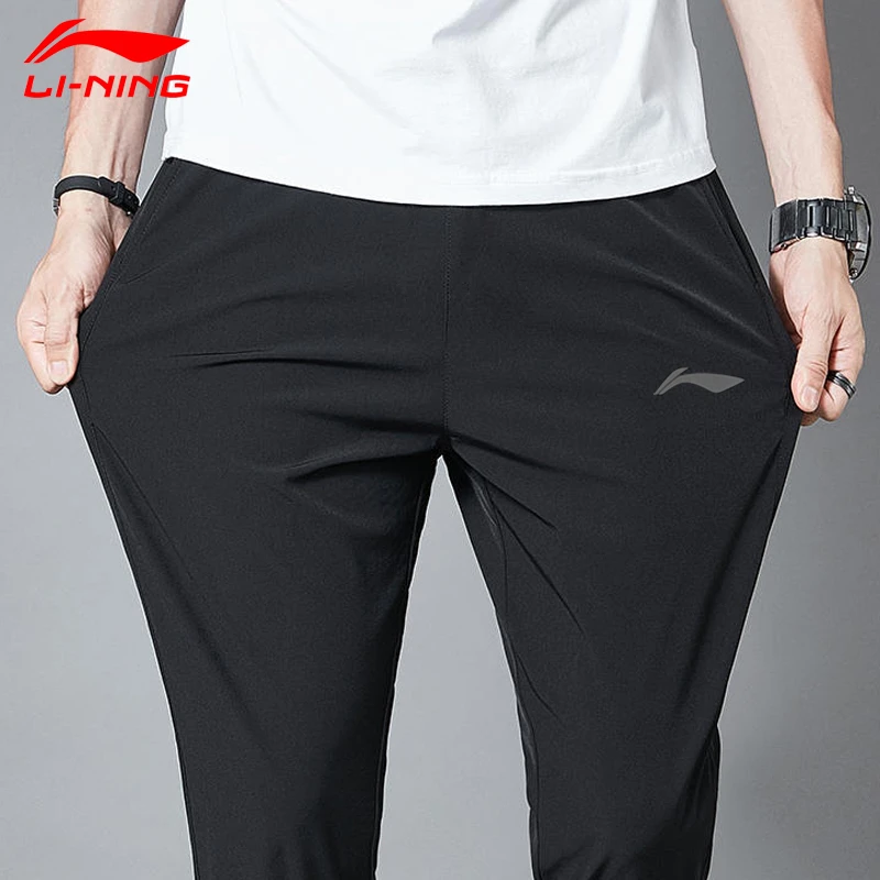 李宁夏季冰丝速干裤男女同款2025休闲运动裤弹力薄款直筒透气长裤