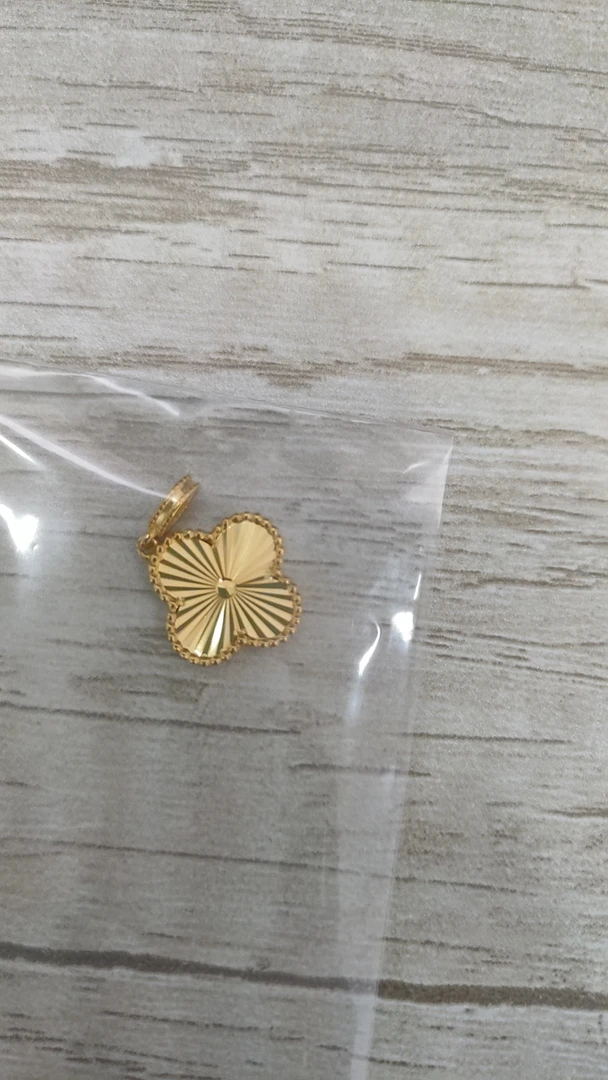 足金999 镭射四草吊坠（椭圆扣）